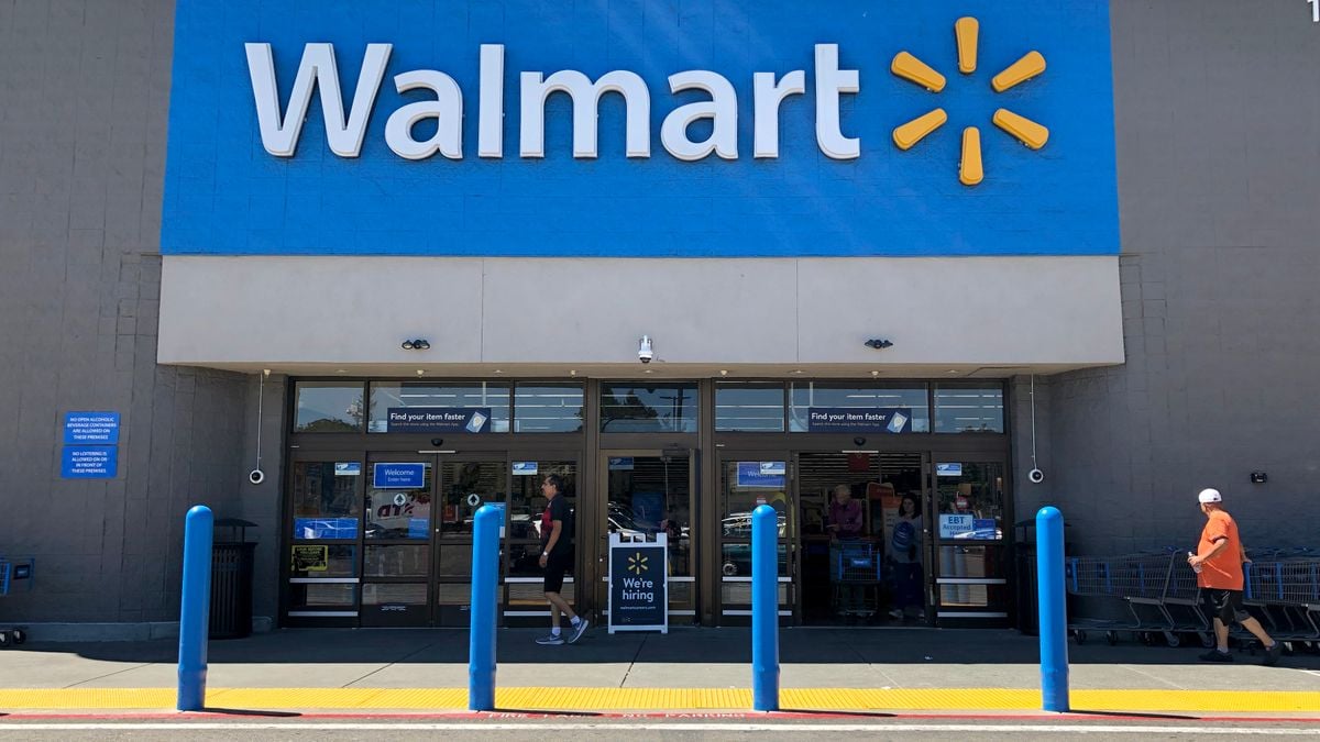 Customers enter a Walmart store in San Leandro, California.