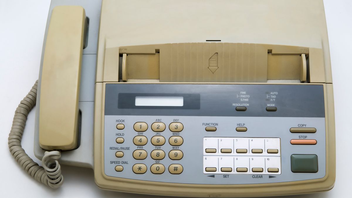 Image of an old fax machine, circa 1980.