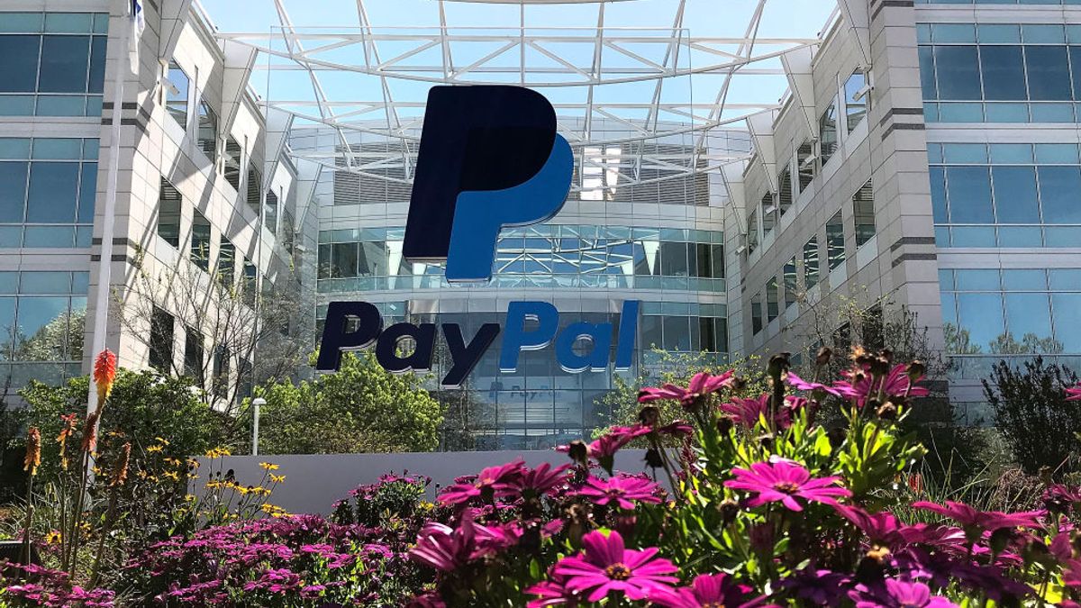 Glass building with PayPal logo